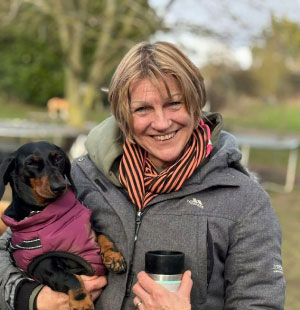 Christine welcoming families at the gate